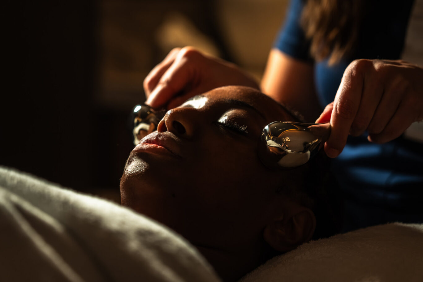 A relaxed guest enjoying soothing facial methods